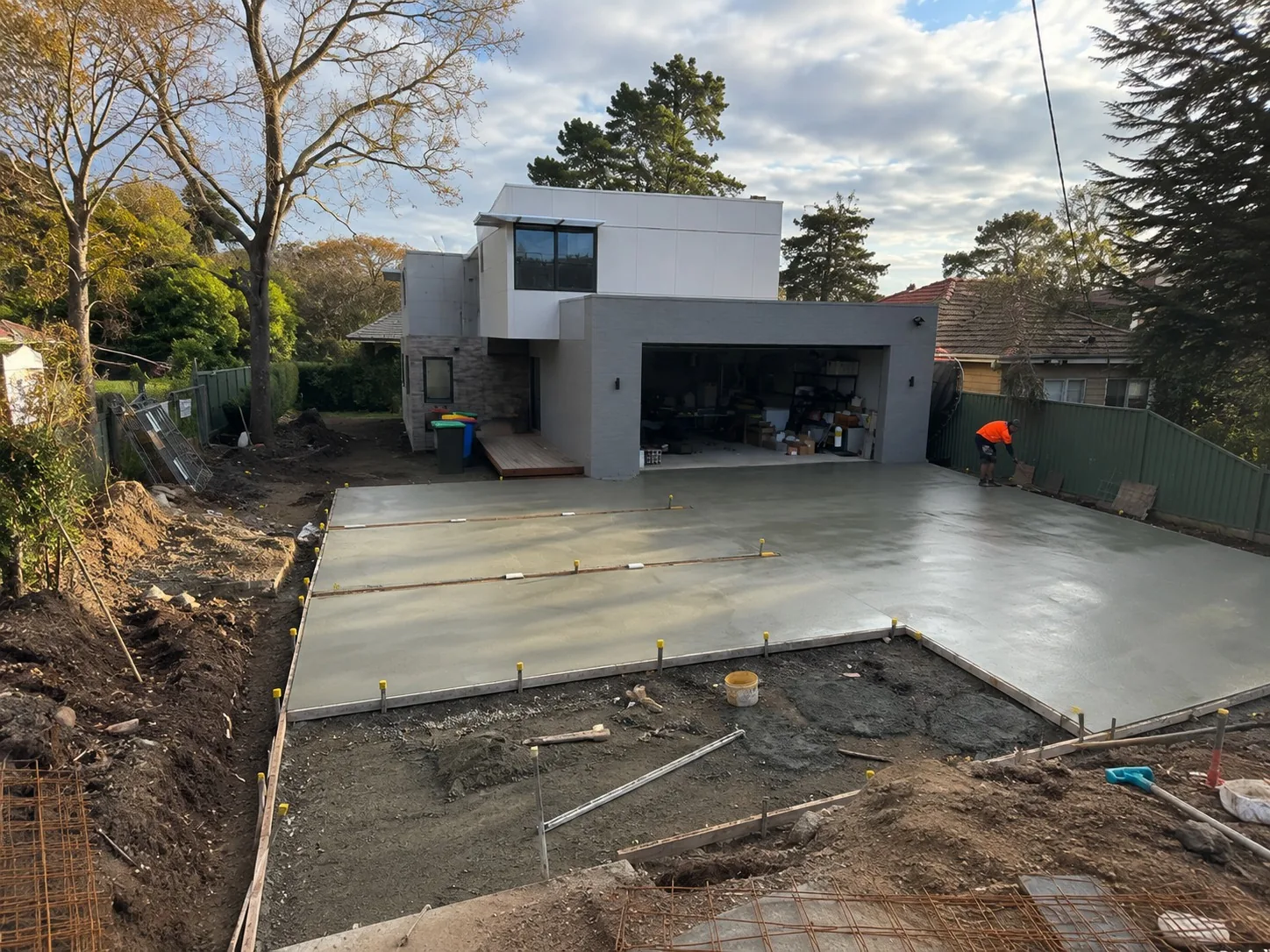 Completed concrete driveway and hardstand at a contemporary Newcastle home